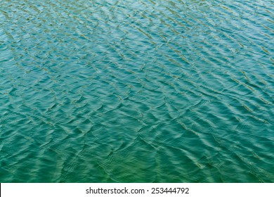 Abstract Green Water Wave In The Lake