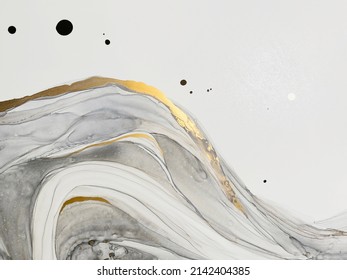 Abstract grey art with gold — black and white background with beautiful smudges and stains made with alcohol ink and golden paint. Grey fluid texture resembles marble, smoke, watercolor or aquarelle. - Shutterstock ID 2142404385