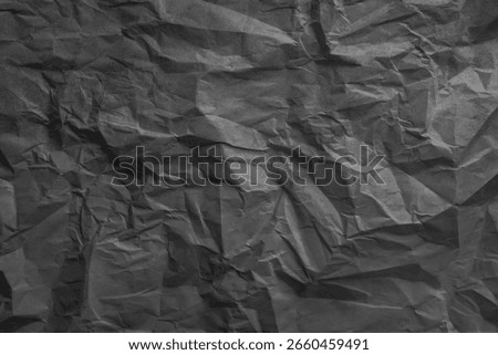 Abstract Grey paper texture background. Texture of crumpled craft paper. Paper background. Recycled Grey paper backdrop in close up. Grey Textures. Wallpaper. Creased kraft sheet art bg