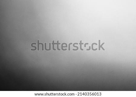 Abstract grunge gray grain noise gradient overlay background with light from corner