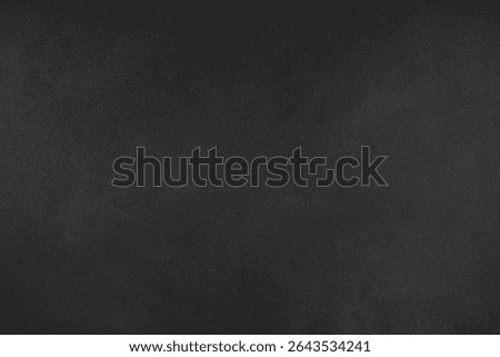 Abstract grungy texture background with different shades of dark matte black color. Painted canvas, concrete surface, studio backdrop, grainy textured effect