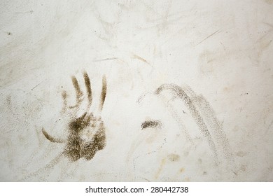 Abstract Hand Print On Concrete Wall