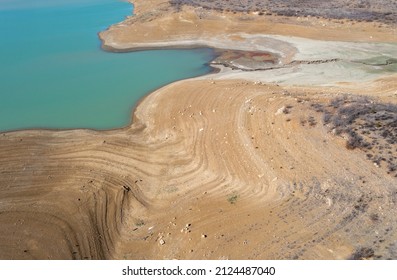 An abstract high angle view of the reservoir and lake in Vinuela