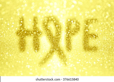Abstract Hope Yellow Gold Ribbon Background For Awareness Of Endometriosis, Bone Cancer, Childhood Cancer, Troops Support And Other Causes