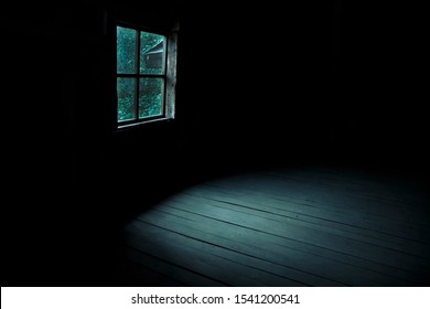Abstract horror background for halloween. Gloomy scary terrible window with ghostly light and shadows in a dark black room in the attic, corridor or basement in an abandoned house in the forest - Shutterstock ID 1541200541