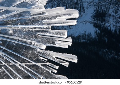 Abstract Ice Sculpture On A Sunny Winter Day In The Mountains