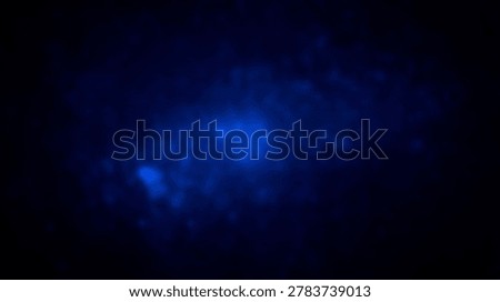 An abstract image of blue light emanating from a dark background. This digital art piece creates a sense of mystery and depth.
