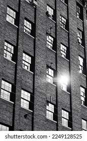 Abstract Image of Brick Building Windows With Reflection