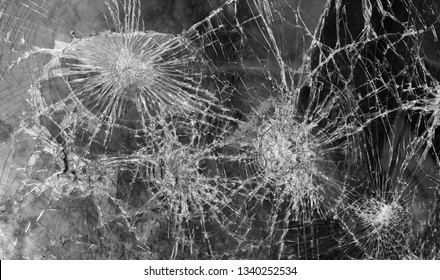 Abstract image of broken glass texture. Close-up broken car windshield. Broken and damaged car
