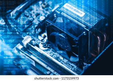 The abstract image of the chipset illumination on the computer mainboard overlay with binary code image. The concept of computer, hardware, futuristic, electronics and technology.