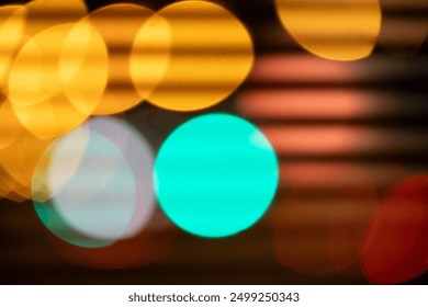 An abstract image with colorful circles of bokeh light in shades of yellow, green and red, creating a dynamic and blurred visual effect. - Powered by Shutterstock - Get 15% off with code: PIKWIZARD15