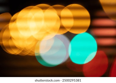 An abstract image with colorful circles of bokeh light in shades of yellow, green and red, creating a dynamic and blurred visual effect. - Powered by Shutterstock - Get 15% off with code: PIKWIZARD15