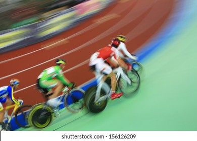 Abstract Image Of Cyclists Running