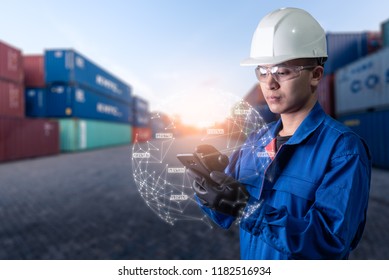 The abstract image of engineer point to the hologram on his smartphone and blurred container yard is backdrop. the concept of communication network internet of things and logistic. - Powered by Shutterstock