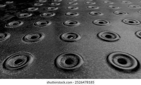 An abstract image featuring circular patterns, creating a sense of movement and repetition.