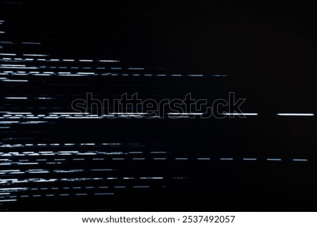 An abstract image featuring a digital glitch effect with horizontal white lines against a dark background, evoking a sense of distortion and interference. 