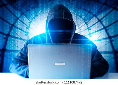 The abstract image of the hacker using a laptop overlay with source code hologram image. the concept of cyber attack, virus, malware, illegally and cyber security.