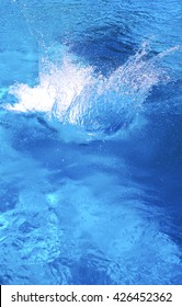Abstract Image Of Large Clear Splash Of Water In A Pool