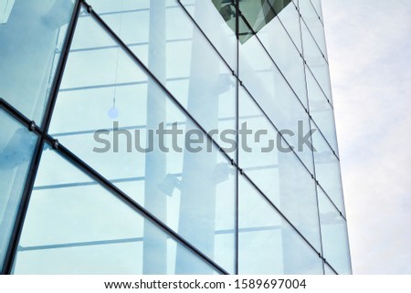 Similar – mirrored facade of an office building