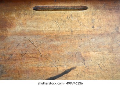 An abstract image of an old wooden desk top.