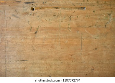 An Abstract Image Of An Old Wooden School Desk Top. 