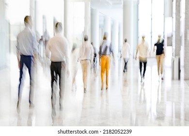 abstract image of people in the lobby of a modern business center with a blurred background - Shutterstock ID 2182052239