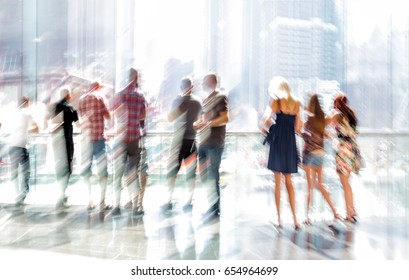 abstract image of people in the lobby of a modern business center with a blurred background - Shutterstock ID 654964699