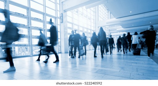 Abstract Image Of People Walking At A Traid Fair Floor