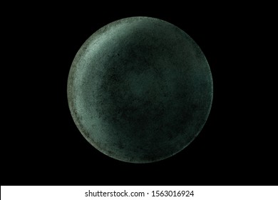 Abstract image of planet Uranus from the surface of an old griddle on a black background in space. 