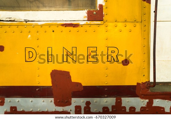 Abstract
image of the side of a vintage diner
wagon.