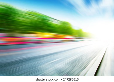 Abstract Image Of Traffic Lights In Motion Blur On The City Street.