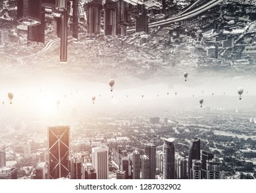 Abstract image of two modern urban worlds located upside down to each other with flying aerostats on the sky background. Wallpaper, backdrop with copyspace.