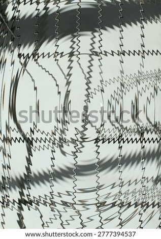 Abstract image - wave distortion of wire dish rack and its shadows