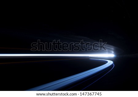 Abstract and interesting art concentration of blue light in a road tunnel