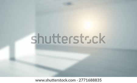 An abstract interior scene with soft sunlight, shadows, and clean lines. The image captures a modern, minimalist aesthetic with a focus on light and shadow play.