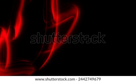 Abstract irregular red light on black background. Long exposure. Light painting photography.