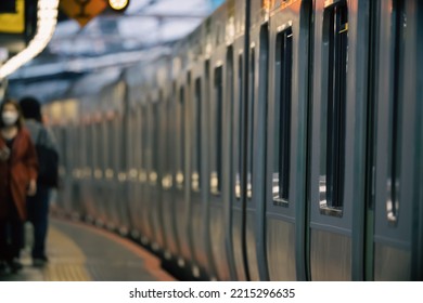 Abstract of Japanese Train stop at platform of train station with passenger boarding and alight the train. Urban commuter and rapid transit in modern city concept. - Powered by Shutterstock