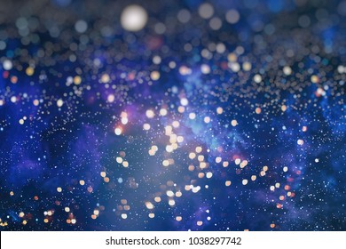 Abstract Light Celebration Background With Defocused Golden Lights For Christmas, New Year, Holiday, Party 