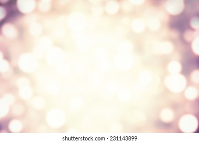 Abstract Light Celebration Background With Defocused Golden Lights For Christmas, New Year, Holiday, Party 