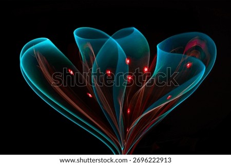 Abstract light form creating the shape of a flower made of luminous trails with selective focus, evoking a futuristic and ethereal feel. Abstract flower lights.