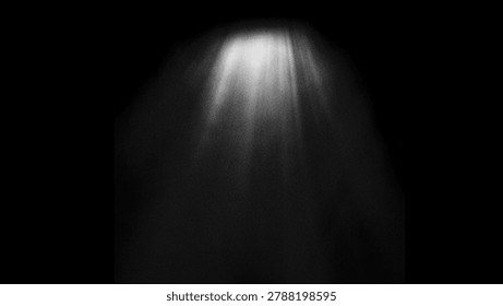 Abstract light rays shining down from above in a dark, grainy atmosphere with a spotlight effect