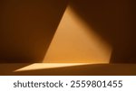 Abstract light and shadow composition featuring a dramatic triangular beam on a warm background, ideal for artistic and minimal designs.
