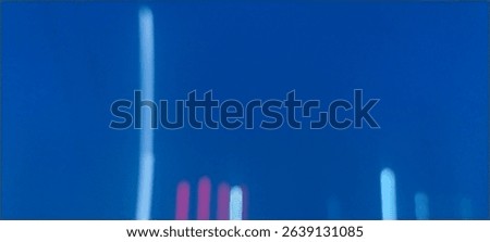 Abstract light trails on a deep blue background, creating vertical glowing lines in white, cyan, and red hues. #AbstractLights #ModernArt
