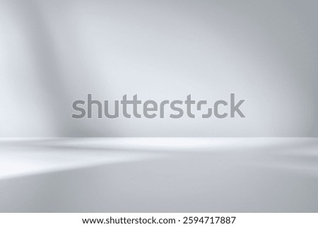 Abstract light from a window, neutral background for product presentation with light reflections and abstract shadow on wall. Mockup.
