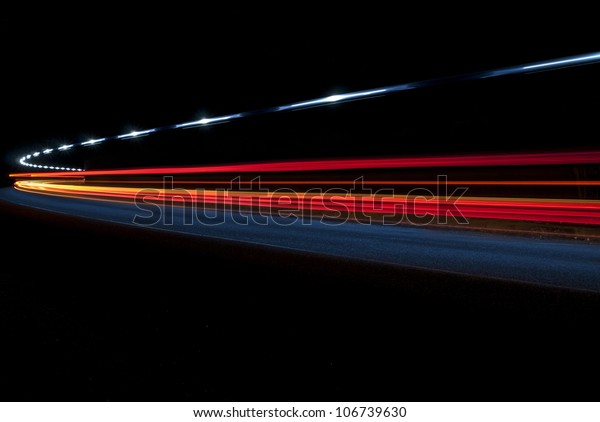 Abstract lights
from an ambulance in a road
tunnel