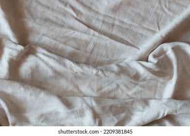 Abstract Linen Fabric Texture Background. Crumpled Off White Linen Textiles Canvas Background. Top View