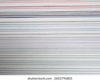 Abstract macro of the fore-edge, or side view, of a textbook 