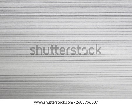 Abstract macro of the fore-edge, or side view, of a textbook 