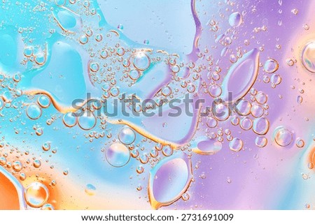 Abstract macro of liquid bubbles in soft blue and purple pastel tones. Delicate fluid texture ideal for beauty, skincare branding, wellness design, and feminine modern backgrounds. 