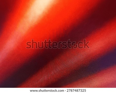 Abstract macro texture of a red LCD screen with dramatic light and shadow beams, close-up of digital pixels forming a futuristic geometric grid backdrop, modern tech asset for graphic design